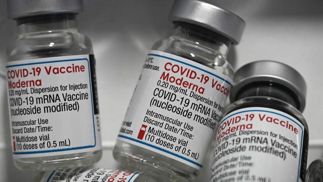 This photograph taken in Merignac on the outskirts of Bordeaux, southwestern France, on December 9, 2021 shows vials of the Moderna Covid-19 vaccine, on the first day of the re-opening of a Covid-19 vaccination centre. (Photo by PHILIPPE LOPEZ / AFP)