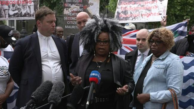 Protesters outside a High Court hearing into the fate of the Chagos Islands