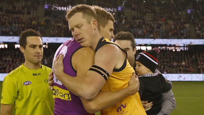 Jack and Nick Riewoldt come together for the coin toss before the gam. Picture: Wayne Ludbey