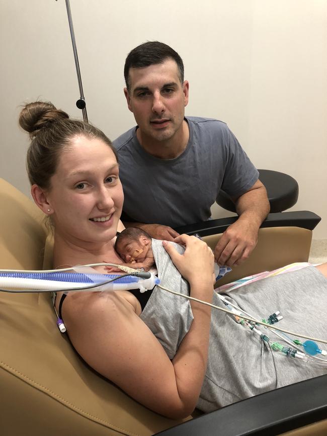 Emily Farquhar and Matt White having first cuddles 18 days after their son Hudson was born at 24 weeks and 5 days gestation at the Flinders Medical Centre in November last year.