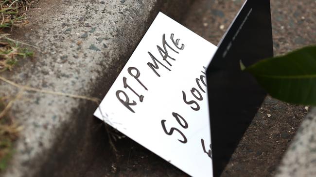 A condolence message left at the scene where Mr Warburton died. Picture: David Clark