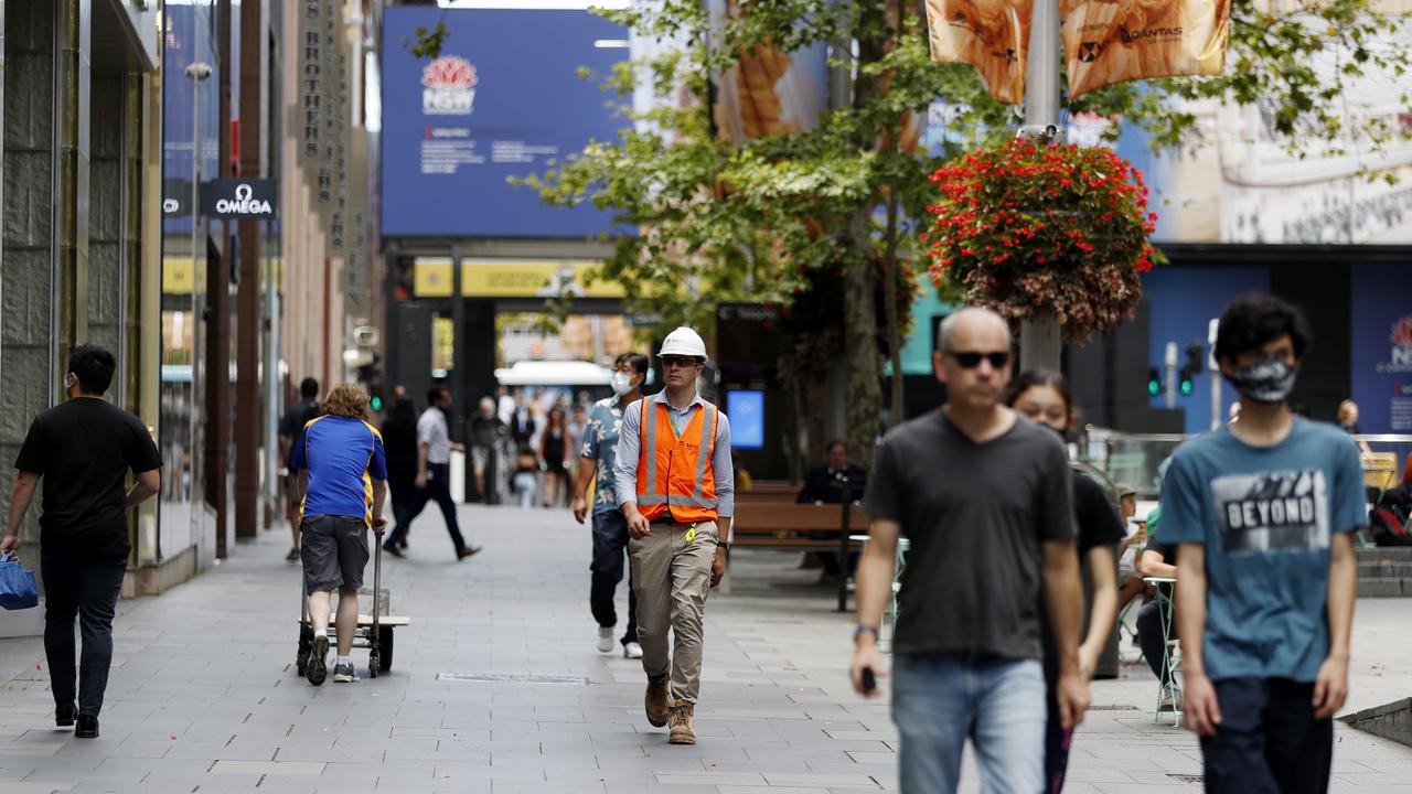 Despite a surge of cases, people are still in Sydney’s CBD – but there are notably fewer as many go into a kind of self-imposed lockdown. Picture: NCA NewsWire/Nikki Short