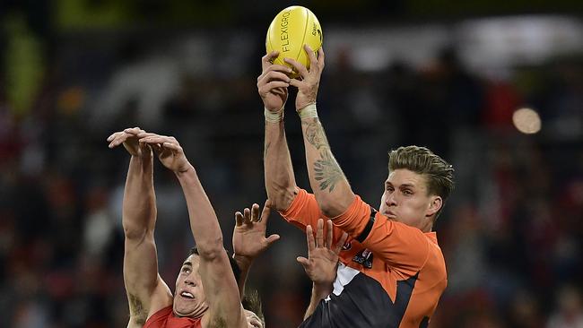 Rory Lobb marks against the Sydney Swans earlier this year. Pic: Getty Images