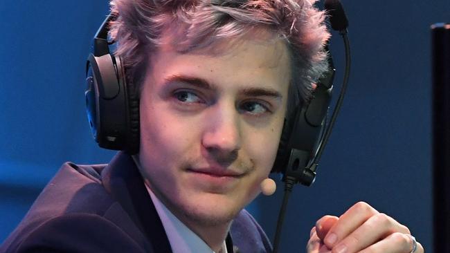 LAS VEGAS, NV - APRIL 21: Twitch streamer and professional gamer Tyler "Ninja" Blevins streams during Ninja Vegas '18 at Esports Arena Las Vegas on April 21, 2018 in Las Vegas, Nevada. Blevins is playing against more than 230 challengers in front of 700 fans in 10 live "Fortnite" games with up to USD 50,000 in cash prizes on the line. He is donating all his winnings to the Alzheimer's Association.   Ethan Miller/Getty Images/AFP == FOR NEWSPAPERS, INTERNET, TELCOS & TELEVISION USE ONLY ==