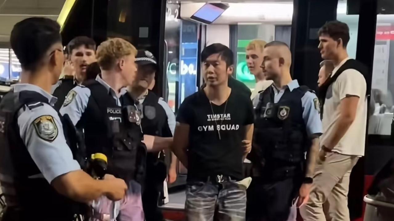 Timstar with police after the hoax triple-0 call.
