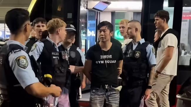 Timstar with police after the hoax triple-0 call.