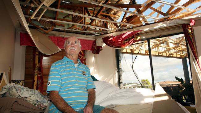 Trevor Hickey survey his damaged home.