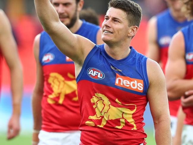 GOLD COAST, AUSTRALIA - AUGUST 15: Dayne Zorko and the Lions celebrate winning the round 12 AFL match between the North Melbourne Kangaroos and the Brisbane Lions at Metricon Stadium on August 15, 2020 in Gold Coast, Australia. (Photo by Chris Hyde/Getty Images)