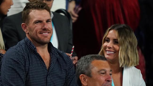 Australian ODI captain Aaron Finch and wife Amy were at Rod Laver to watch the world No.1. Picture: AAP