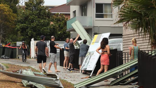 A roof falls on a property at Bondi Rd, Bondi after a brief storm hit the area. Picture: Brett Costello