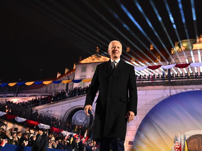 Joe Biden walks on stage upon arrival to deliver a speech at the Royal Warsaw Castle Gardens in Warsaw. Picture: AFP