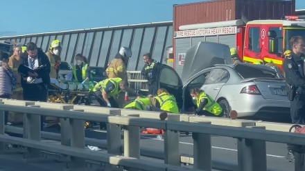 Emergency services treating patients in the immediate aftermath of the crash.