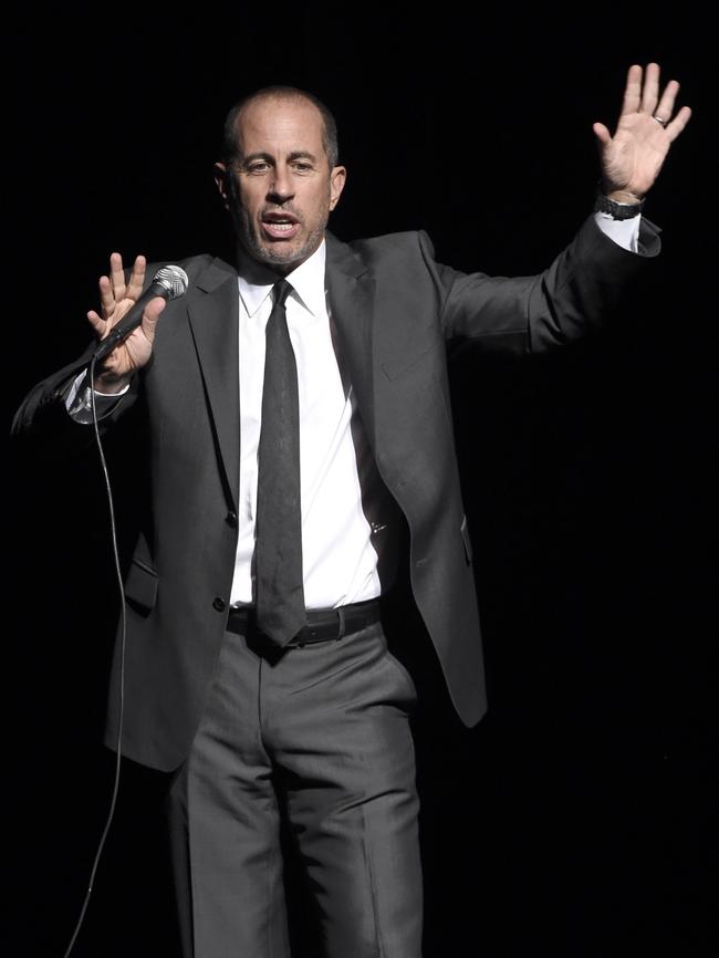 Jerry Seinfeld on stage.