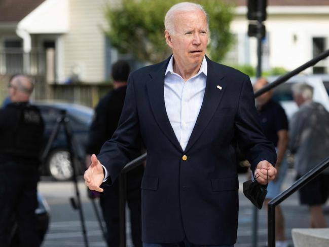 US President Joe Biden made “jump-rope” motions to indicate he was okay outside St Edmond’s Catholic Church. Picture: AFP