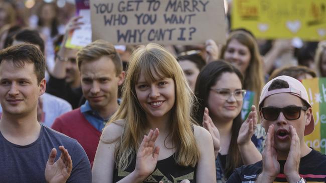 Australians have made it clear in poll after poll that they want marriage equality. So why are we considering blowing $160 million on a non-binding plebiscite, particularly when domestic violence initiatives are critically underfunded. (Pic: Brook Mitchell/Getty)