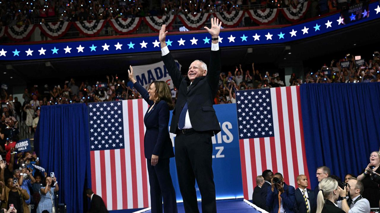 Mr Walz with the Democratic presidential nominee, Kamala Harris. Picture: Brendan Smialwoski/AFP