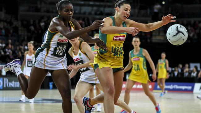 Madi Robinson beats Precious Mthembu to the ball in her international return against South Africa.