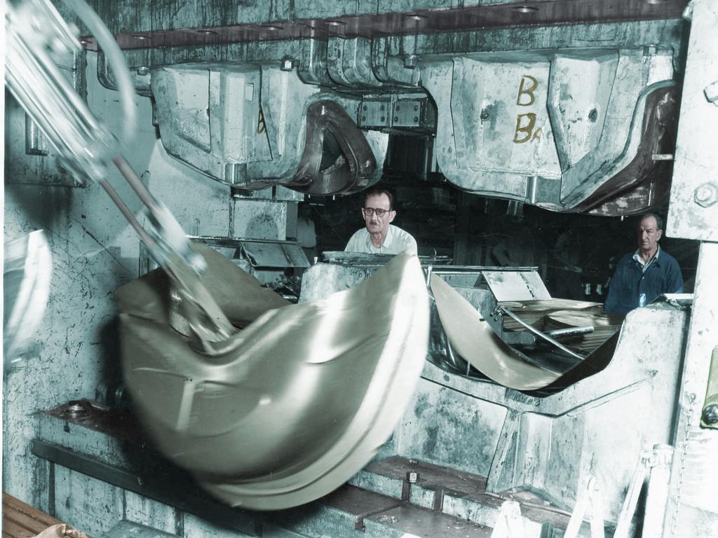 An ‘automatic hand’ lifting a newly-pressed Holden fender from a giant press at the General Motors-Holden plant in Woodville in September 1958. Pic: General Motors Holden’s Pty. Ltd. Public Relations Dept, Melbourne