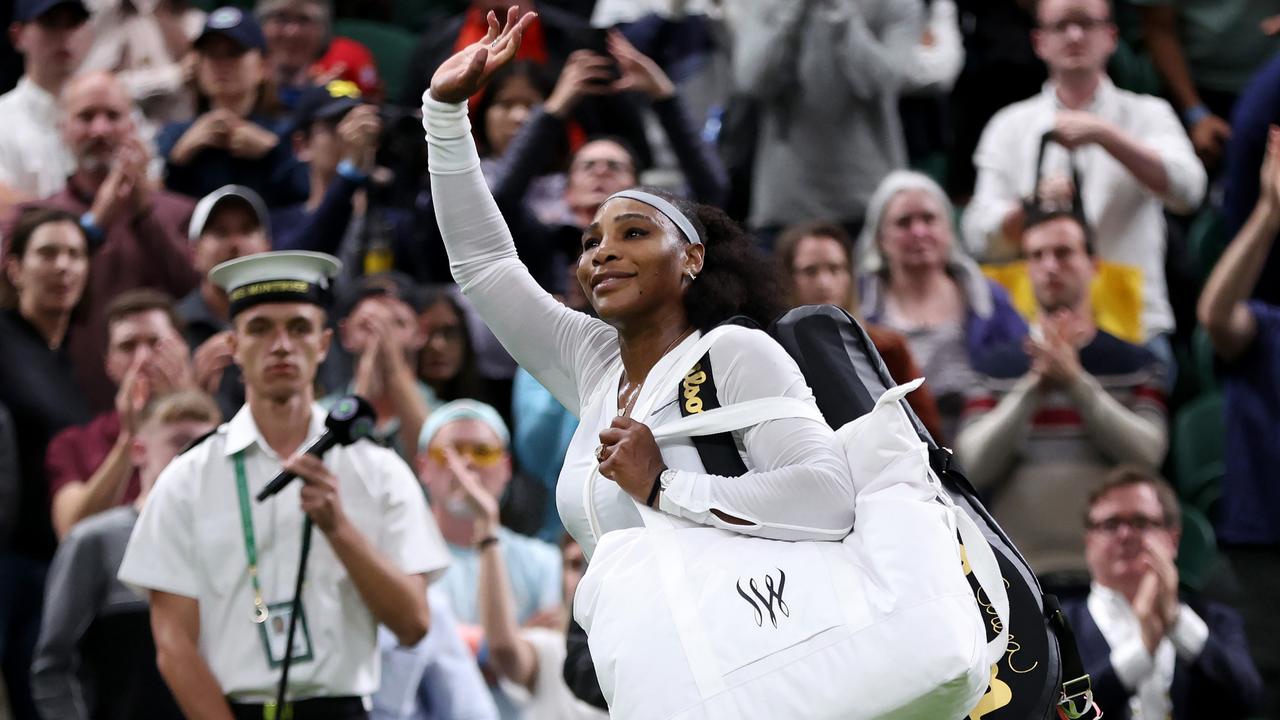 LONDON, ENGLAND - JUNE 28: Serena Williams of The United States waves to the crowd after losing against Harmony Tan of France during their Women's Singles First Round Match on day two of The Championships Wimbledon 2022 at All England Lawn Tennis and Croquet Club on June 28, 2022 in London, England. (Photo by Clive Brunskill/Getty Images)