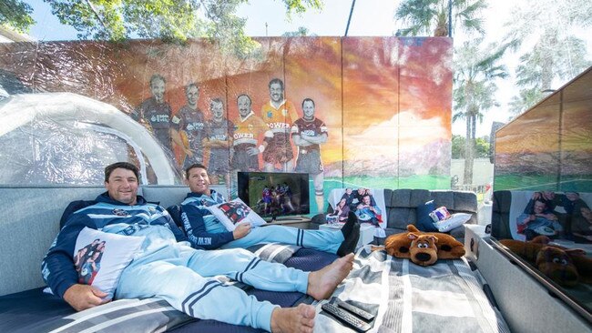 Nathan Hindmarsh and Brian Fletcher in their bubble at Suncorp Stadium for the NRL's Magic Round.