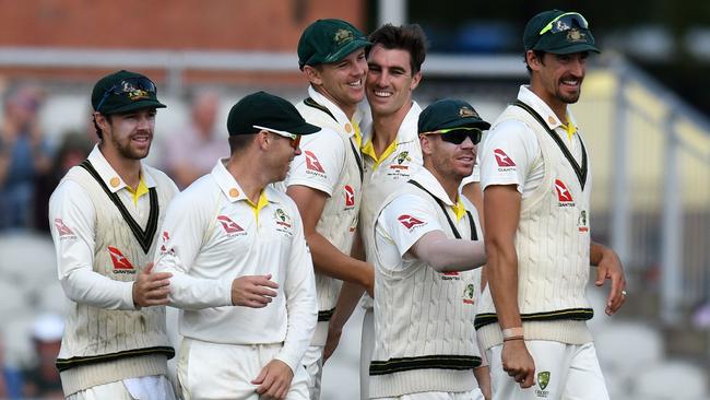 Pat Cummins and the Aussies celebrate retaining the Ashes in Manchester.