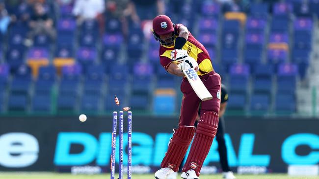 Roston Chase of West Indies is bowled by Josh Hazlewood. Picture: Francois Nel/Getty