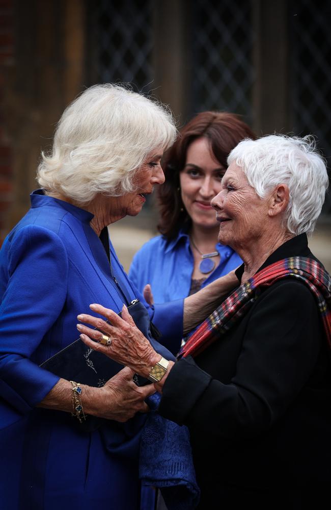 Britain's Queen Camilla meets with British actor Judi Dench during a reception for the inaugural Queen's Reading Room Literary Festival. Picture: Getty Images