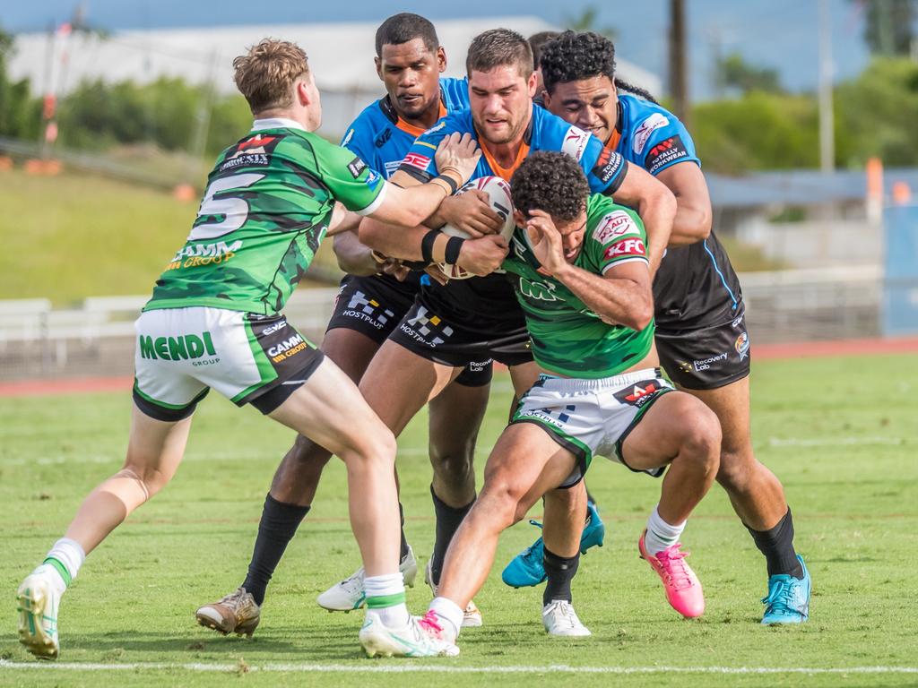 Northern Pride players tackle their Townsville Blackhawks opponent in the Hostplus Cup match at Barlow Park. Picture: CHRIS ROBSON
