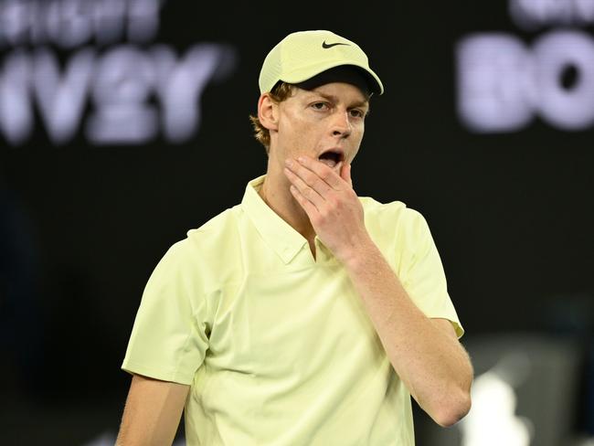 MELBOURNE, AUSTRALIA - JANUARY 16: Jannik Sinner of Italy reacts in the Men's Singles Second Round match against Tristan Schoolkate of Australia during day five of the 2025 Australian Open at Melbourne Park on January 16, 2025 in Melbourne, Australia. (Photo by Hannah Peters/Getty Images)