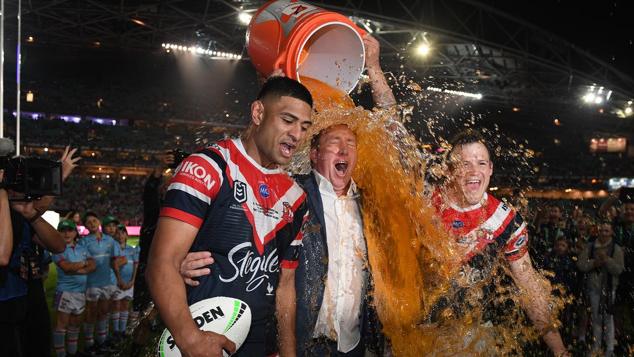 Tupou and Trent Robinson have won three titles together. Picture: AAP Image/Dan Himbrecht