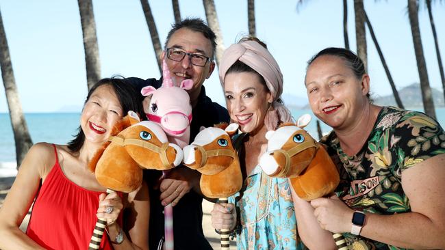 The Far North’s iconic Melbourne Cup beach horse race will have a different look this year. Nu Nu Restaurant at Palm Cove has been running the popular event for more than 10 years, but this year will be running a hobby horse race. Mo and Jason Rowbottom with Victoria Carpenter and Amy Escott from Nu Nu restaurant with the hobby horses ready for the day. Picture: Stewart McLean