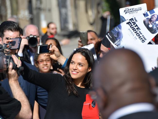 Michelle Rodriguez and Vin Diesel were mobbed when they visited New York City’s Washington Heights on behalf of The Fate Of The Furious on April 11. Picture: Mike Coppola