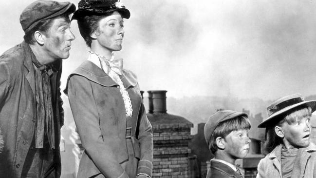 Actor Dick Van Dyke with actress Julie Andrews and child actors in 1964 film Mary Poppins.