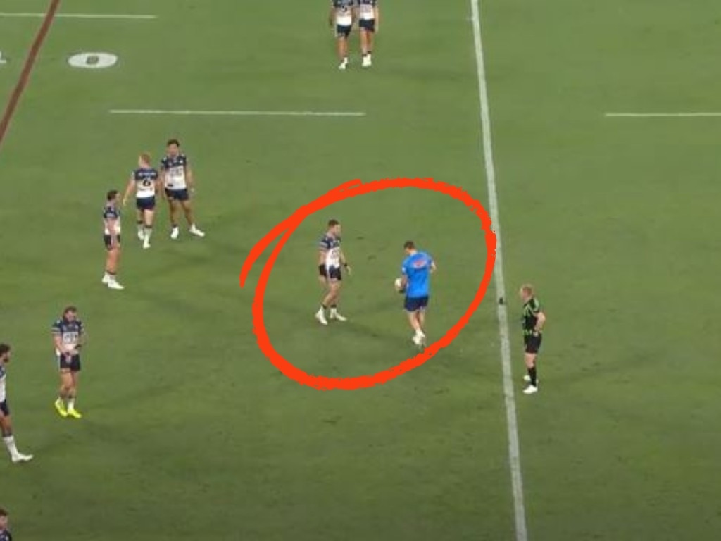 Cowboys trainer captured wetting the ball.