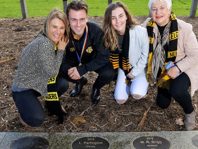 Magarey Medallist Luke Partington with his mum Amanda Partington sister Shae Partington  and Nanna Beverley Ollivier with his plaque on Magarey Grove Adelaide Oval,Saturday September 21,2019,(Image AAP/Mark Brake)