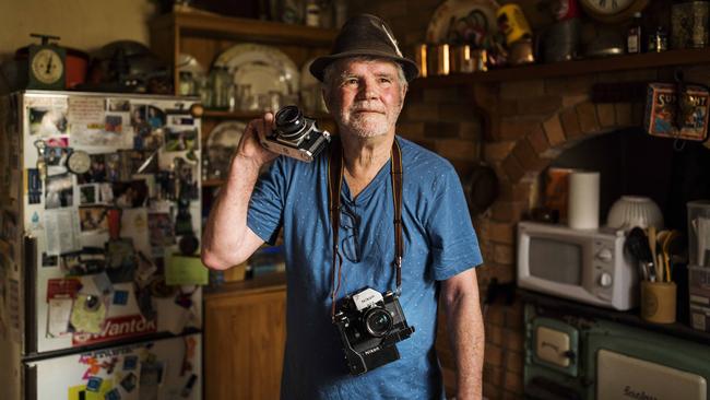 Bill Errington, with cameras similar to the ones he used in Vietnam, spent two years as a combat photographer before the onset of post-traumatic stress. Picture: Sean Davey.