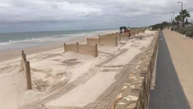 Beach trial: These fences have been erected in a bid to stop sand drift. Picture: Supplied