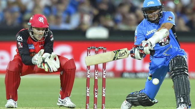 Brad Hodge plays a shot for the Strikers against the Melbourne Renegades. Hodge wants to play for Adelaide again in the next Big Bash League season. Picture: David Mariuz (AAP)