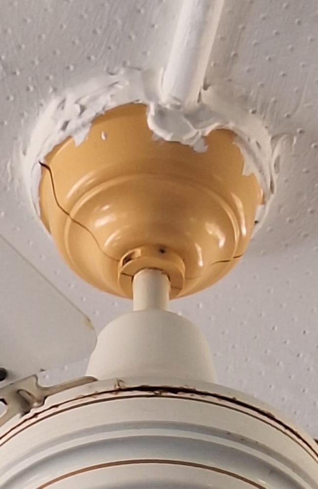 Sealant around a fan. Parents claim the work to isolate the asbestos was not done according to standard protocol, which the Department denies.