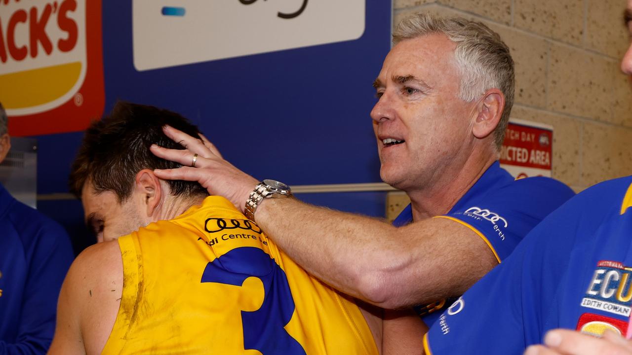 West Coast players and coach Adam Simpson enjoy their upset win. Picture: Michael Willson/AFL Photos via Getty Images