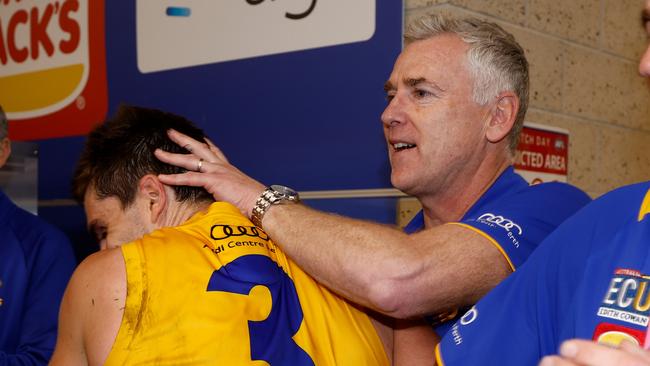 West Coast players and coach Adam Simpson enjoy their upset win. Picture: Michael Willson/AFL Photos via Getty Images