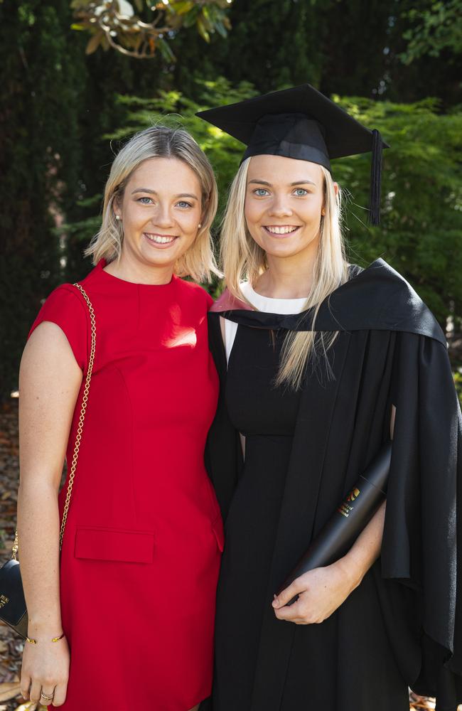 Maddy Forrest congratulates her sister Ainsley Forrest on her graduation with a Bachelor of Education (Primary) at a UniSQ graduation ceremony at The Empire, Tuesday, October 29, 2024. Picture: Kevin Farmer