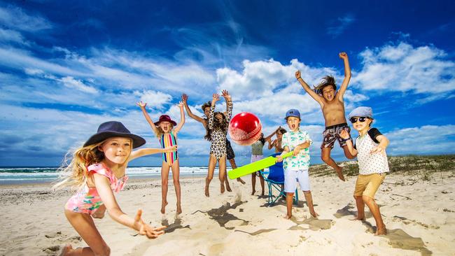 The Peterson family from Currumbin celebrate their annual Boxing Day Test at Currumbin beach. Eadie, 10, Mabel, 6, Jack, 16, Ruby, 12, Hugh, 11, Finn, 9, Wes, 7, Will, 13 and Elkie Peterson, 8. Picture: Nigel Hallett.
