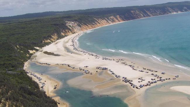 BEACH GRIDLOCK: Huge crowds at the Cooloola Coast helped turn the beach at Double Island Point into a very busy car park as fabulous weather drew huge crowds to camping areas between Teewah and Inskip Point, packing out Rainbow Beach in the process.