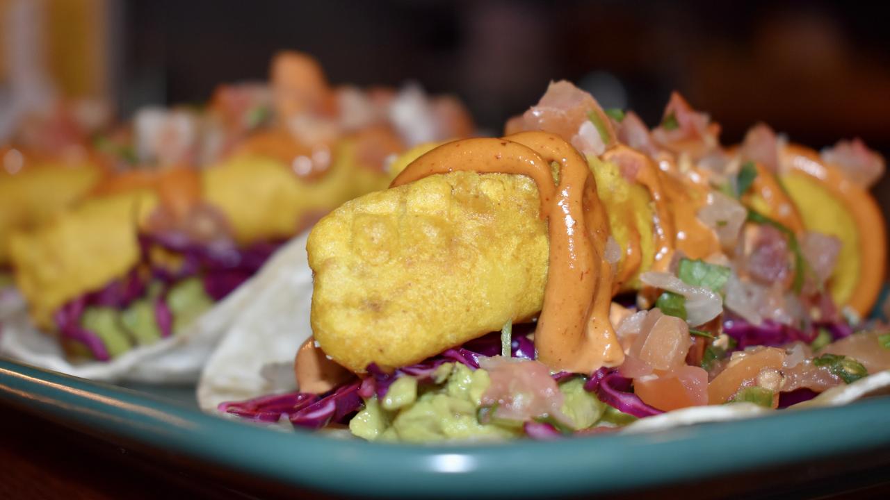 Local delights like these tacos from neighbouring Tres Salsas can now be enjoyed at 19XO. Picture: Isabella Magee