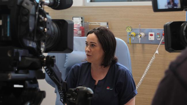 Clare Scullion gets the first Covid-19 vaccine administered at Coffs Harbour hospital's vaccination hub on Wednesday Martch 17.  Photo: Tim Jarrett / Coffs Coast Advocate