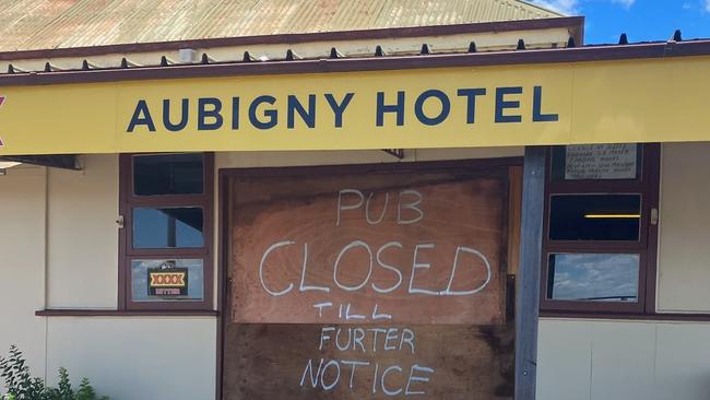 The sign on the front of the Aubigny Hotel outside Toowoomba, which closed last week.