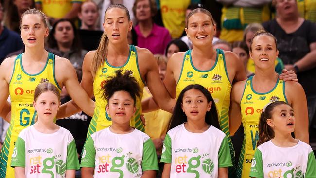 Paige Hadley (far right) and Bruce (second from right) arm in arm during the Diamonds’ series against England last year. Picture: Getty Images