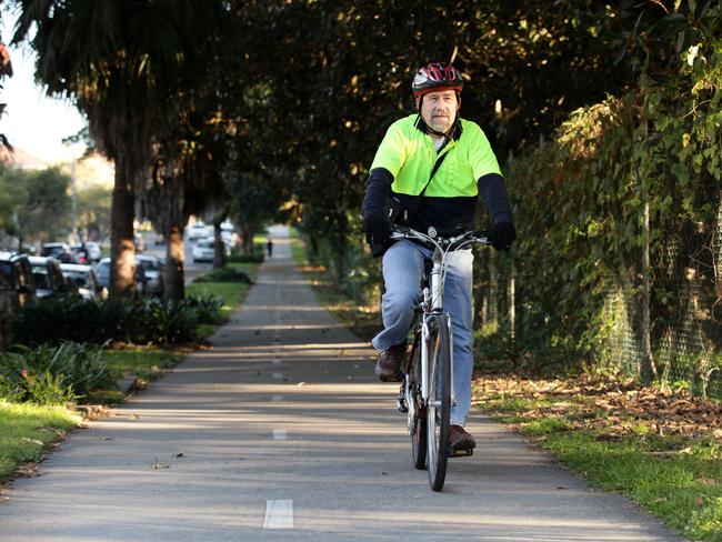 Cyclist riding the cycleway on Wansey Rd at Randwick.