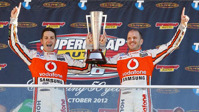 Whincup (L) celebrates victory at the 2012 Bathurst 1000 with co-driver Paul Dumbrell. Picture: Brad Hunter